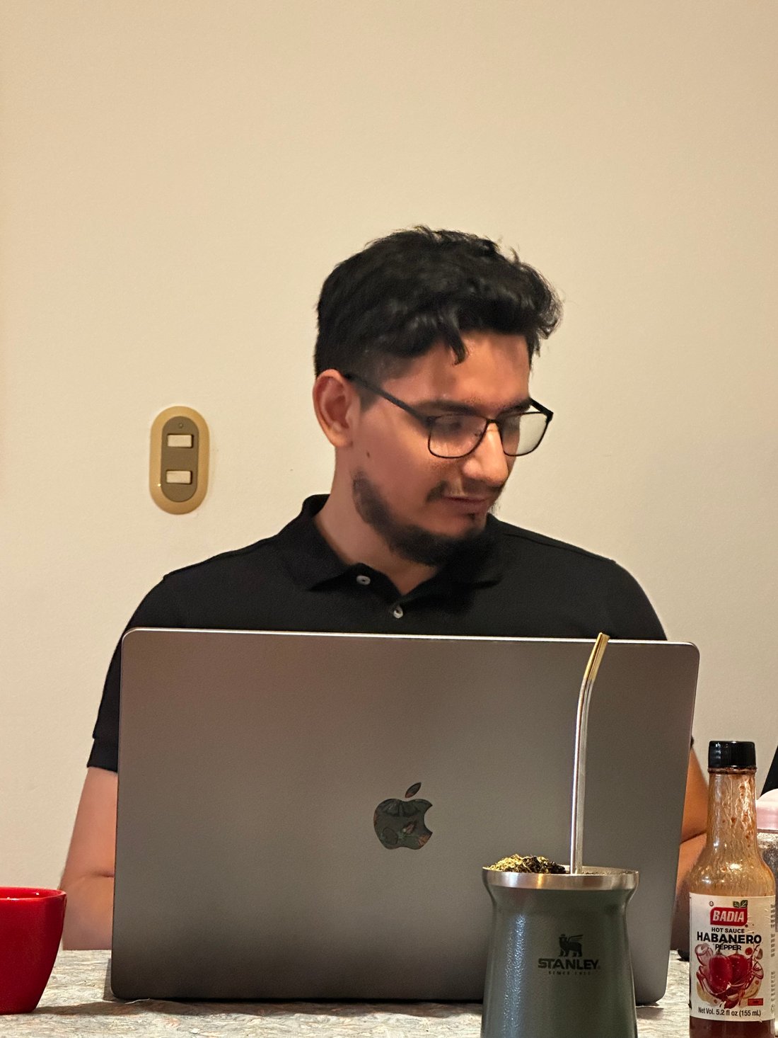 Guillermo with mate and laptop